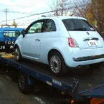 ドナドナされる愛車の空色チンクイーノ